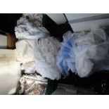around 6 boxes of textiles- curtains, nets, lace etc