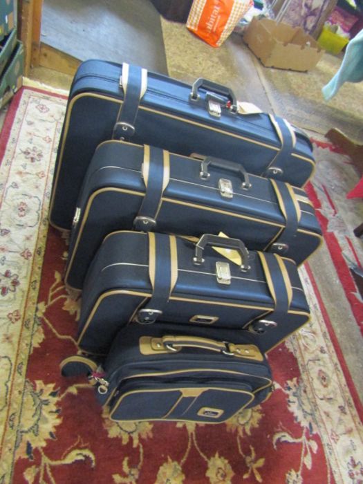 Matching set of 4 Antler suitcases