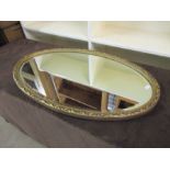 Oval gilded wall mirror 43cm x 72cm approx