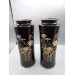 Pair of black and gold vases