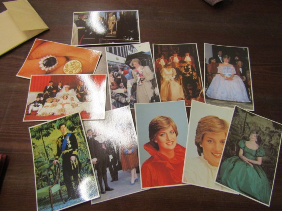 A box of loose vintage postcards including newspaper postcards of Diana plus an empty photo album - Image 2 of 9