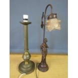 A brass lamp base and a bronze coloured lamp with figure of a woman