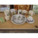 A collection of children's china items