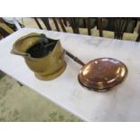 Brass coal scuttle and copper bed warmer