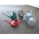 2 galvanised watering cans, galvanised bucket and 2 other watering cans
