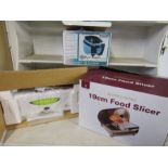 Food slicer, sonic cleaning system and food packaging system- all in boxes and look unused