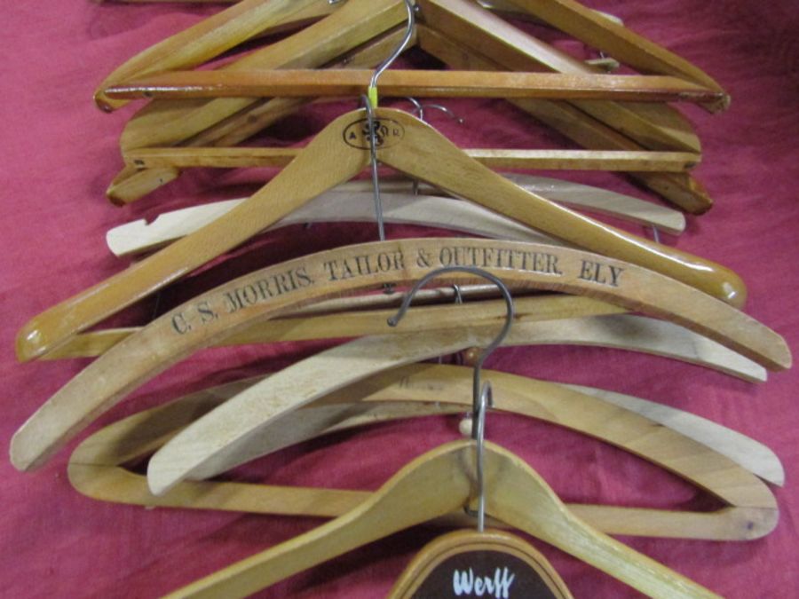 Wooden coat hangers, some branded including C.S Morris Taylor's of Ely - Image 3 of 4