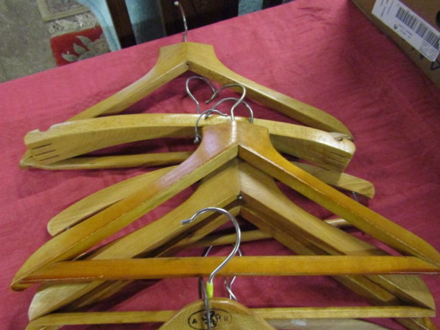 Wooden coat hangers, some branded including C.S Morris Taylor's of Ely - Image 4 of 4