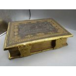 A large Bible in a hard backed case with clasp feature