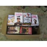 Box of DVD's and VHS tapes