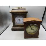 2 wooden clocks