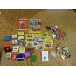 Vintage Matchbox catalogues, cigarette cards, badges and keyrings etc