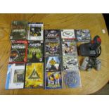 Box of Sony Playstation and PC games, Playstation joypad and PC joystick
