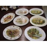 7 oval platters with country scenes 13.5"