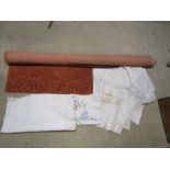 Box of textiles including upholstery fabric and embroidered cloths etc
