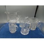 5 various glass jugs, tallest 23cm