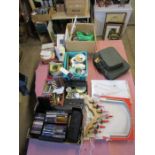 A job lot of sundries to include cutlery sets, a retro luggage set, pinking shears, christmas