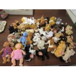 A collection of TY beanie babies and collectors magazines