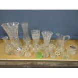 A collection of quality cut glass vases, jugs, frogs etc etc