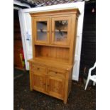 New Zealand Pine dresser with glazed doors to top and 2 drawers and 2 door cupboard underneath