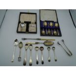 A silver plated pusher set for feeding a baby in original box, six plated tea spoons in original