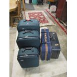 5 Suitcases including matching set of 3