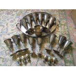 Metal goblets, egg cups and a tray