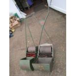 2 Vintage push lawnmowers made by Ransomes and Webb