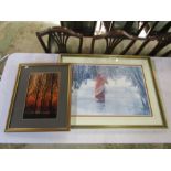 A photo of a forest scene and a print of an icy scene