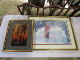 A photo of a forest scene and a print of an icy scene