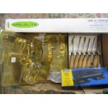 A box of assorted sundries to include 3 new brass door handle sets