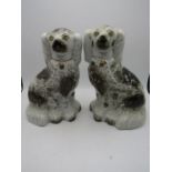 A pair of Staffordshire spaniels