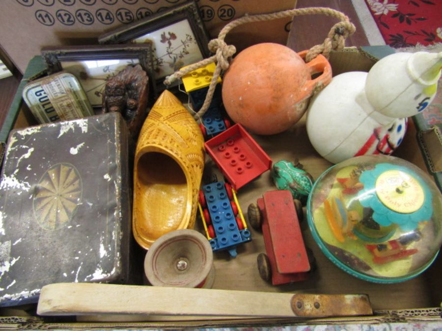 A box of vintage toys and sundries