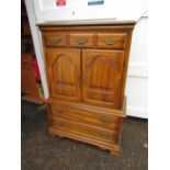 Hardwood cupboard with one drawer above two door cupboard and 2 drawers below and featuring small