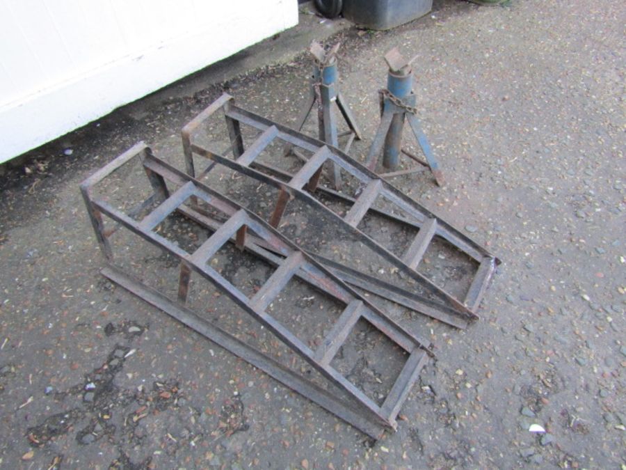 Pair of metal ramps and pair of axle stands