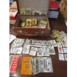 Football cards, cigarette cards and 2 wads of air mile vouchers in a vintage suitcase 1960-1970s?