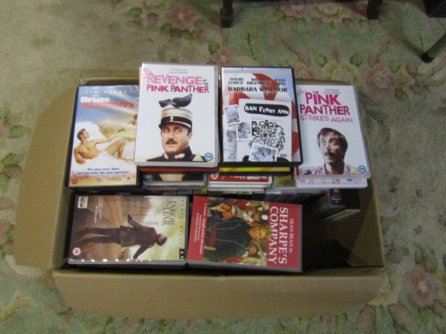 Box of DVD's and VHS tapes
