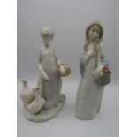 2 figures in the style of Lladro