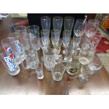 A box of advertising glasses inc Coca cola, Guiness etc