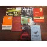 A collection of motorcar ephemera and 3 Triumph motorcycle 1950's manuals and 3 carts, carriages and