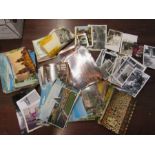 A collection of postcards and photos