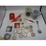 Royal Memorabilia to include pin badge, mugs, 1977 jubilee napkin, caddy spoon, a collection of