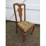 Walnut dining chair with upholstered seat
