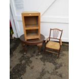 Coffee table with ball and claw feet, child's armchair with wicker seat and bedside cabinet