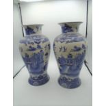 Pair of blue and white oriental style porcelain vases, 36cm tall