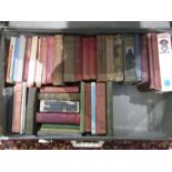 A suitcase of vintage books