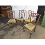 Set of 4 ornate dining chairs with upholstered seats and ball and claw feet