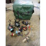 Green fishing box with reels