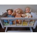 3 vintage dolls - A 'Tiny tears' a 'Fisher price 1982' and a 1985 Cabbage patch kid in a rocking