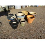 A quantity of ceramic, terracotta garden pots